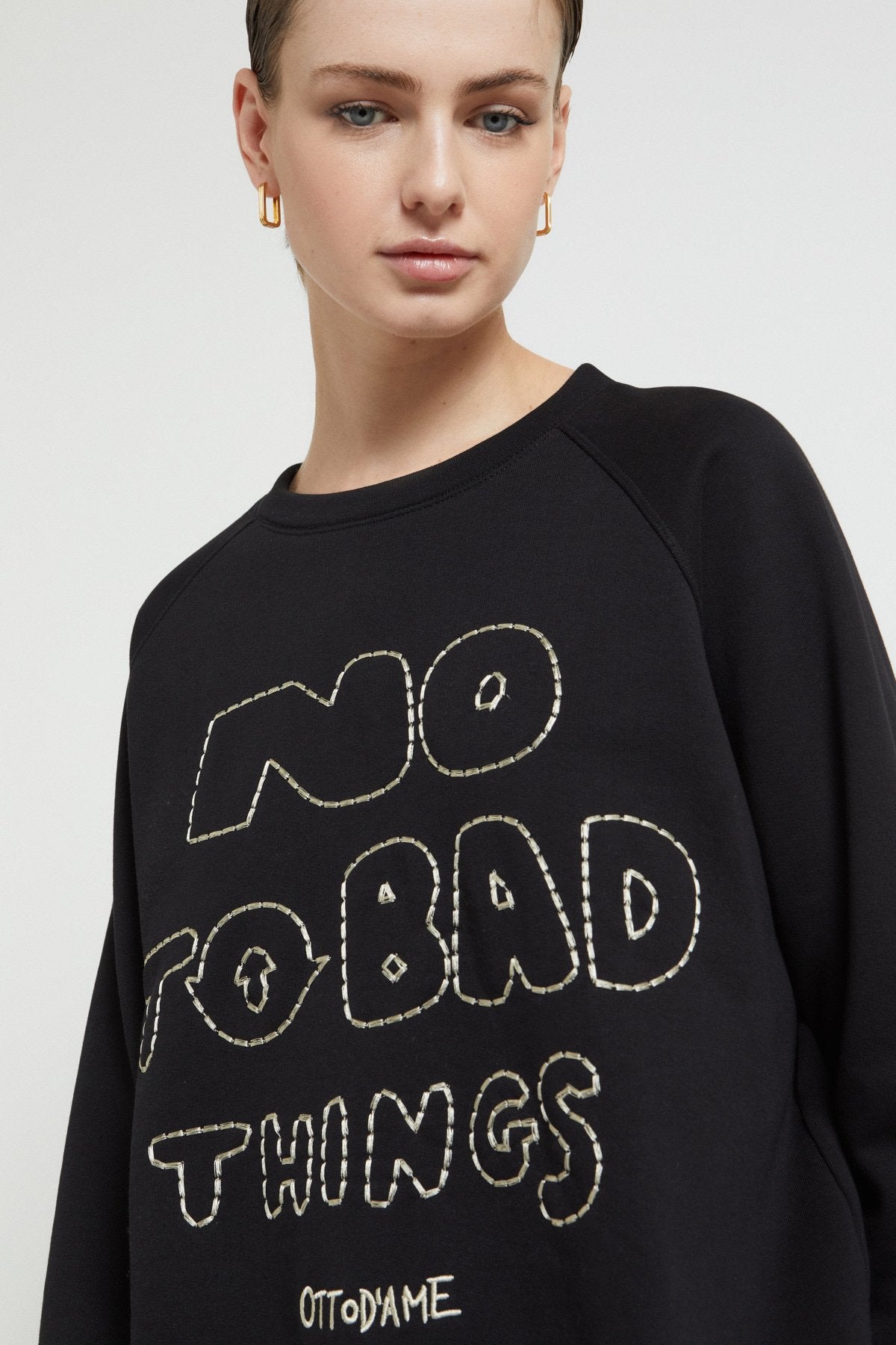 Pure cotton sweatshirt with slogan and sequin embroidery