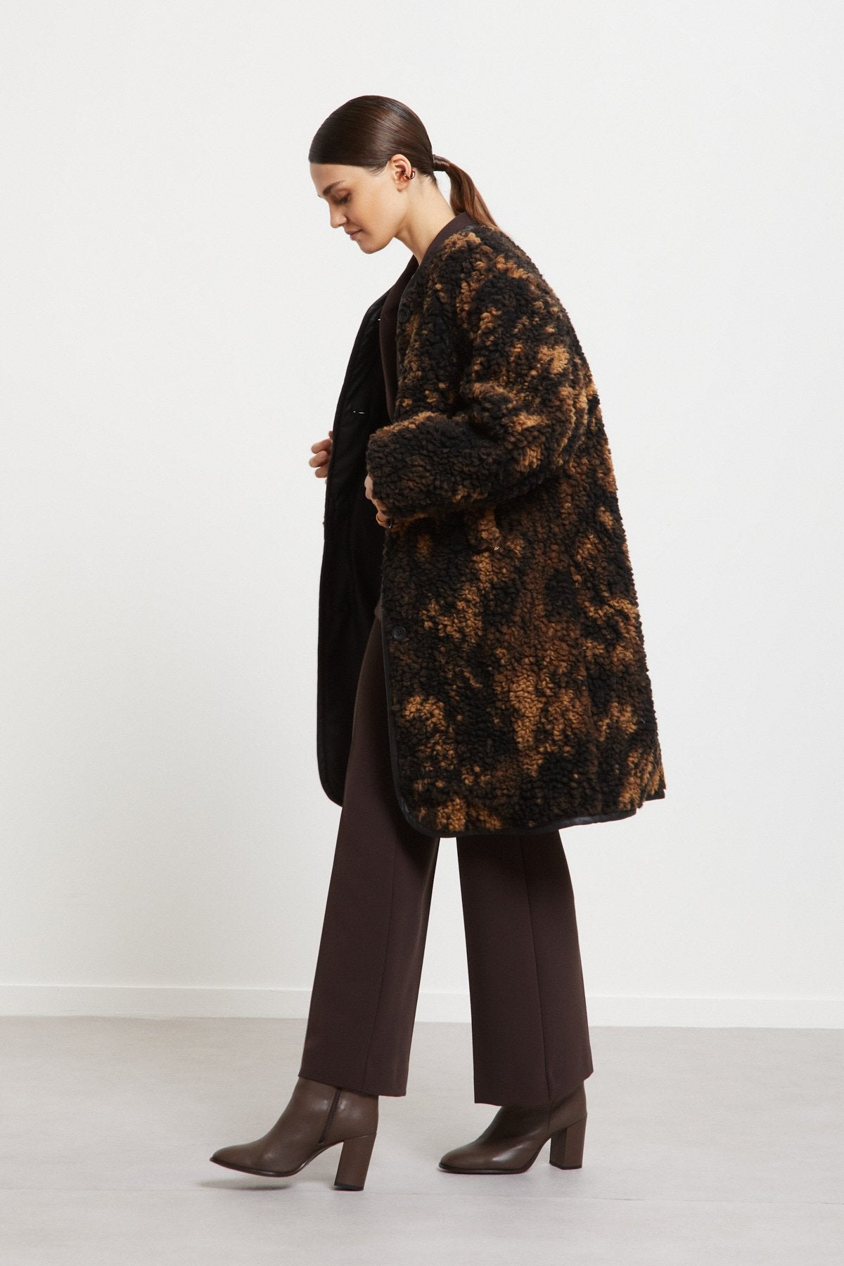 Oversized midi coat lined with faux fur