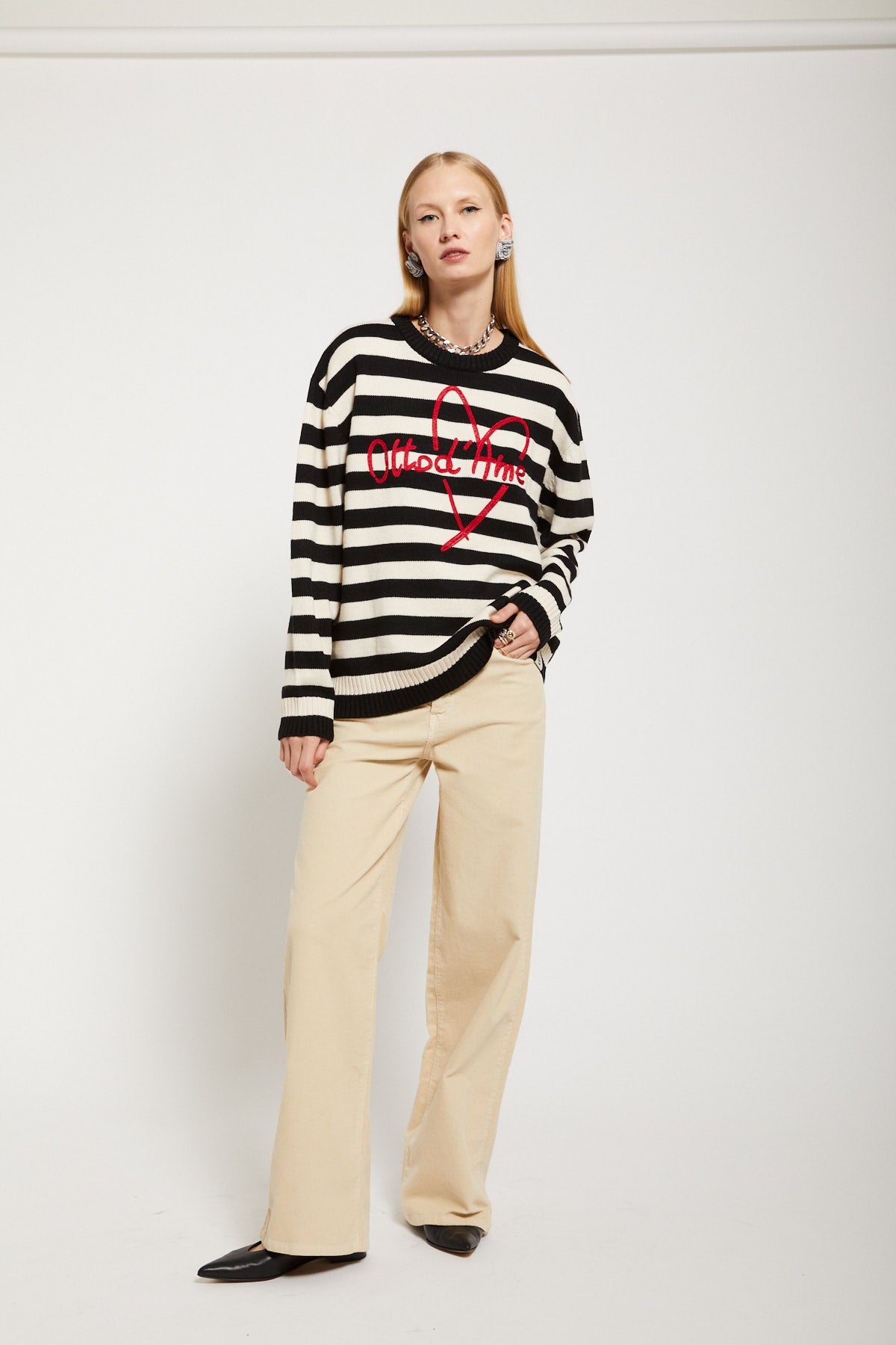 Border and embroidered wool blend sweater