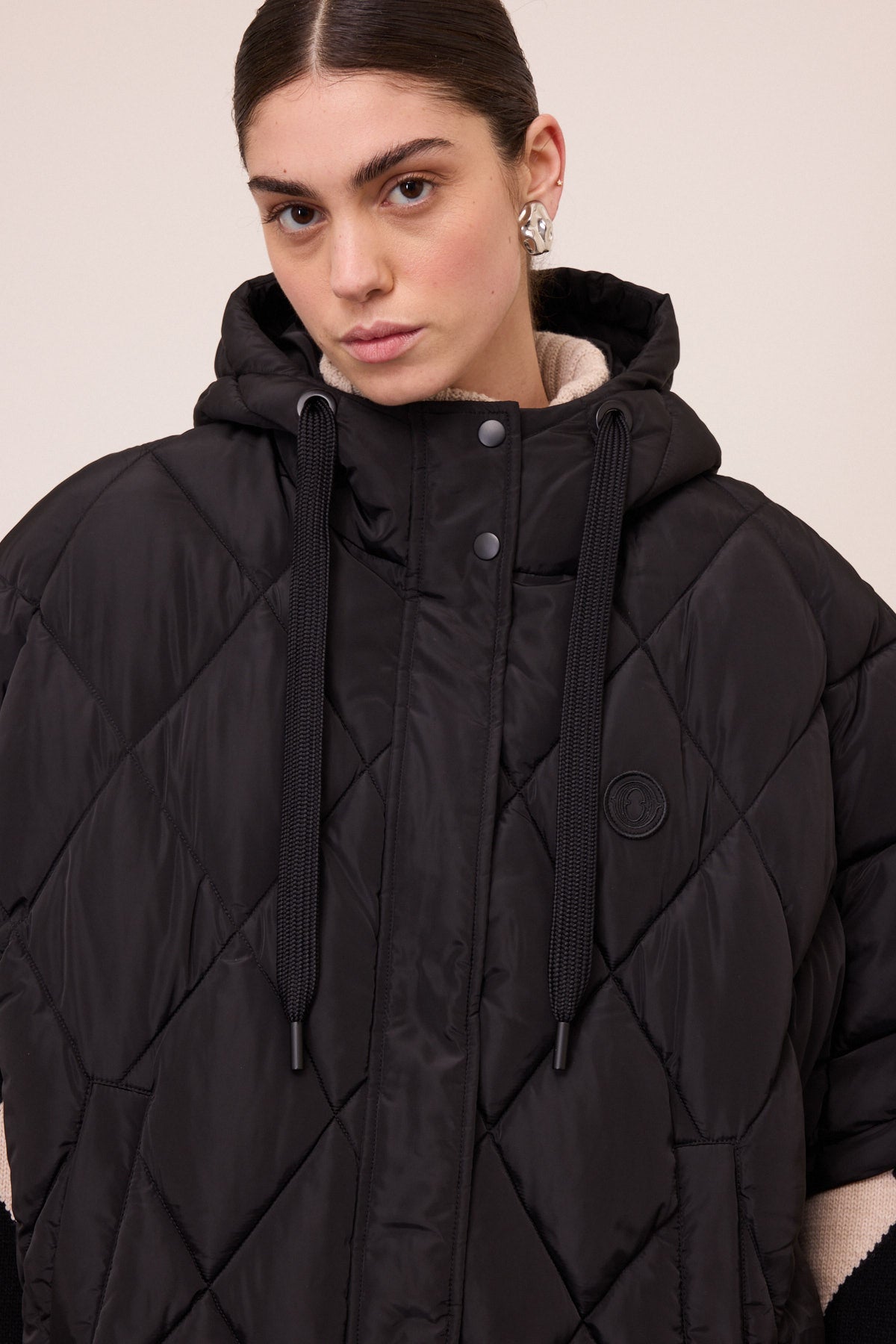 poncho style down jacket
