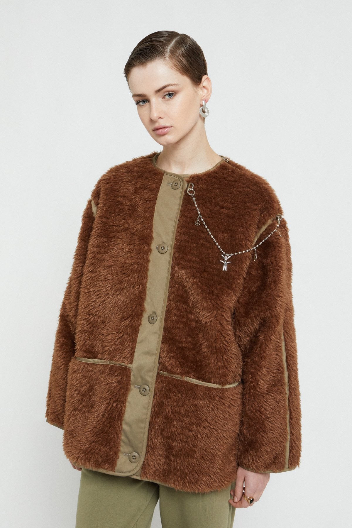 Fake fur jacket with chain