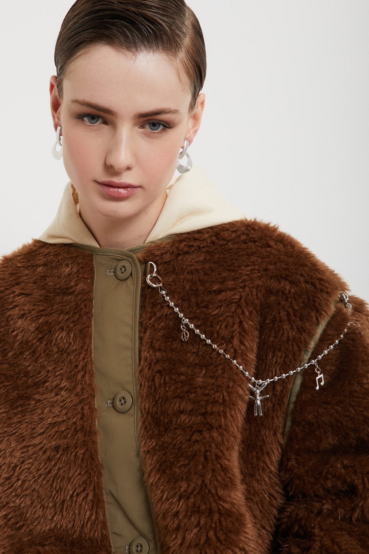 Fake fur jacket with chain
