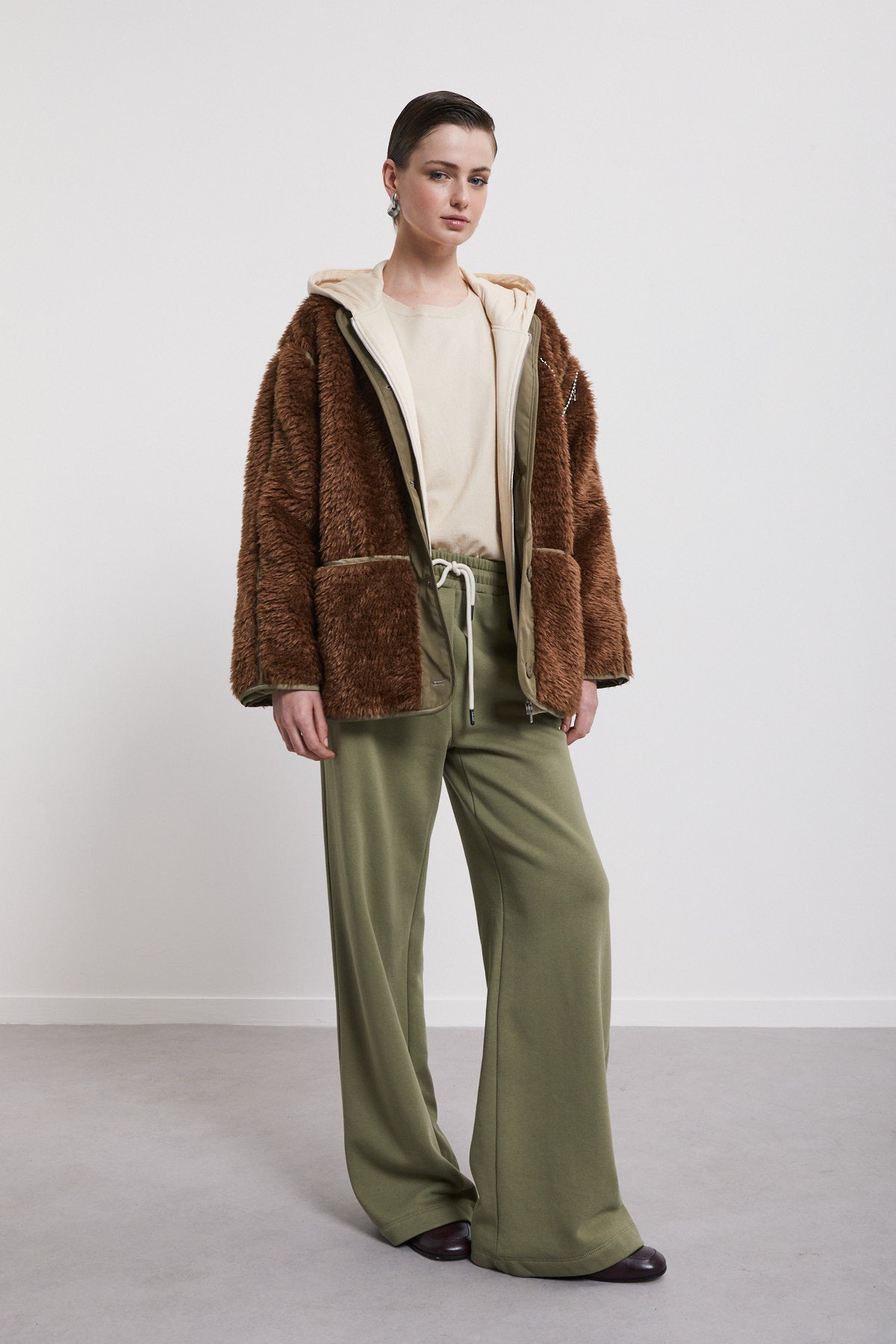 Fake fur jacket with chain