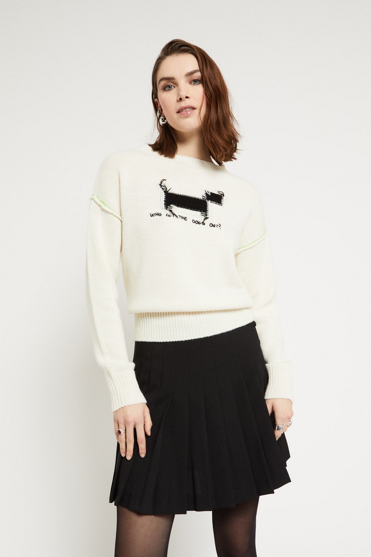 Wool blend sweater with raw edges,intarsia,and embroidery