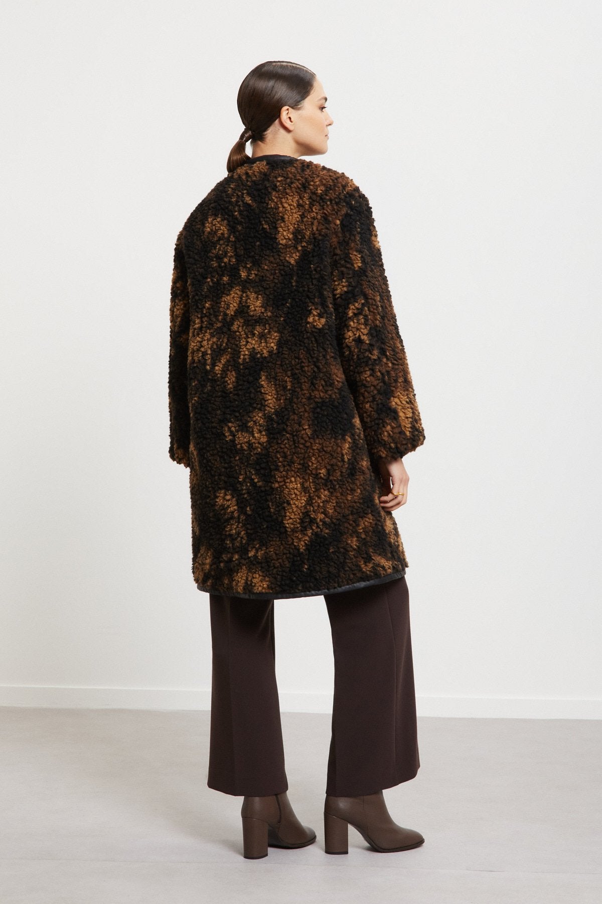 Oversized midi coat lined with faux fur