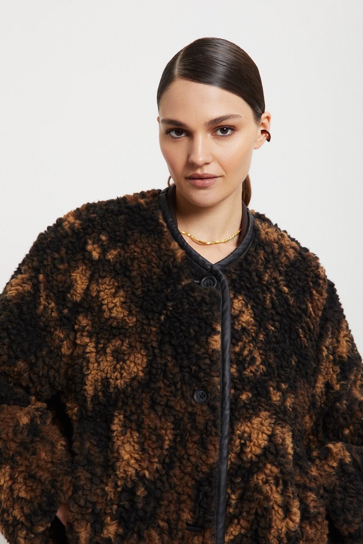 Oversized midi coat lined with faux fur
